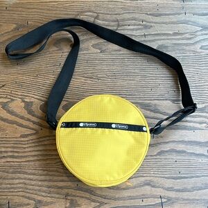 Like NEW! LeSportsac Sunny Yellow Round Bag with Black Strap crossbody